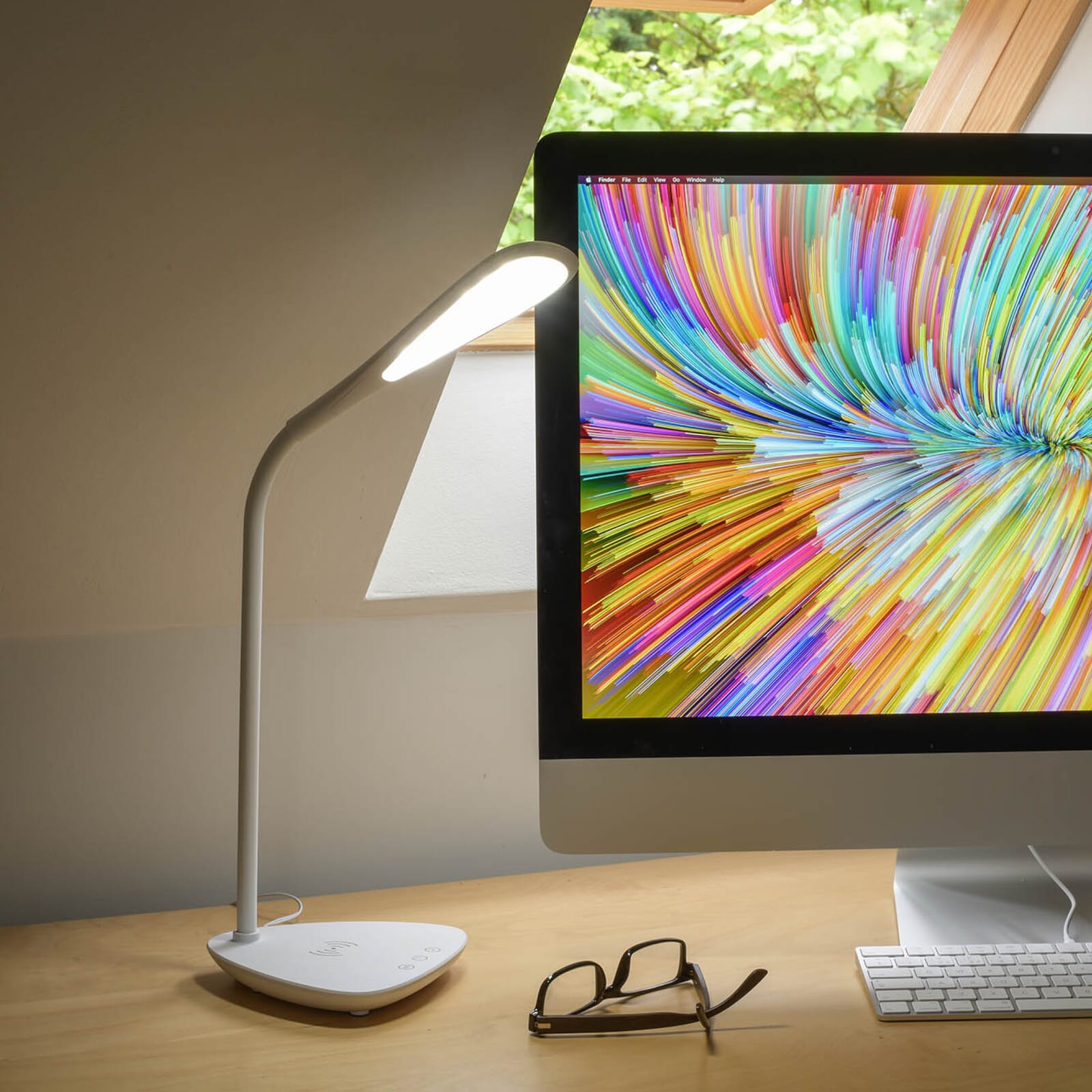 The Koble Elliptical is a modern desk lamp, that incorporates wireless charging for compatible smartphones. 