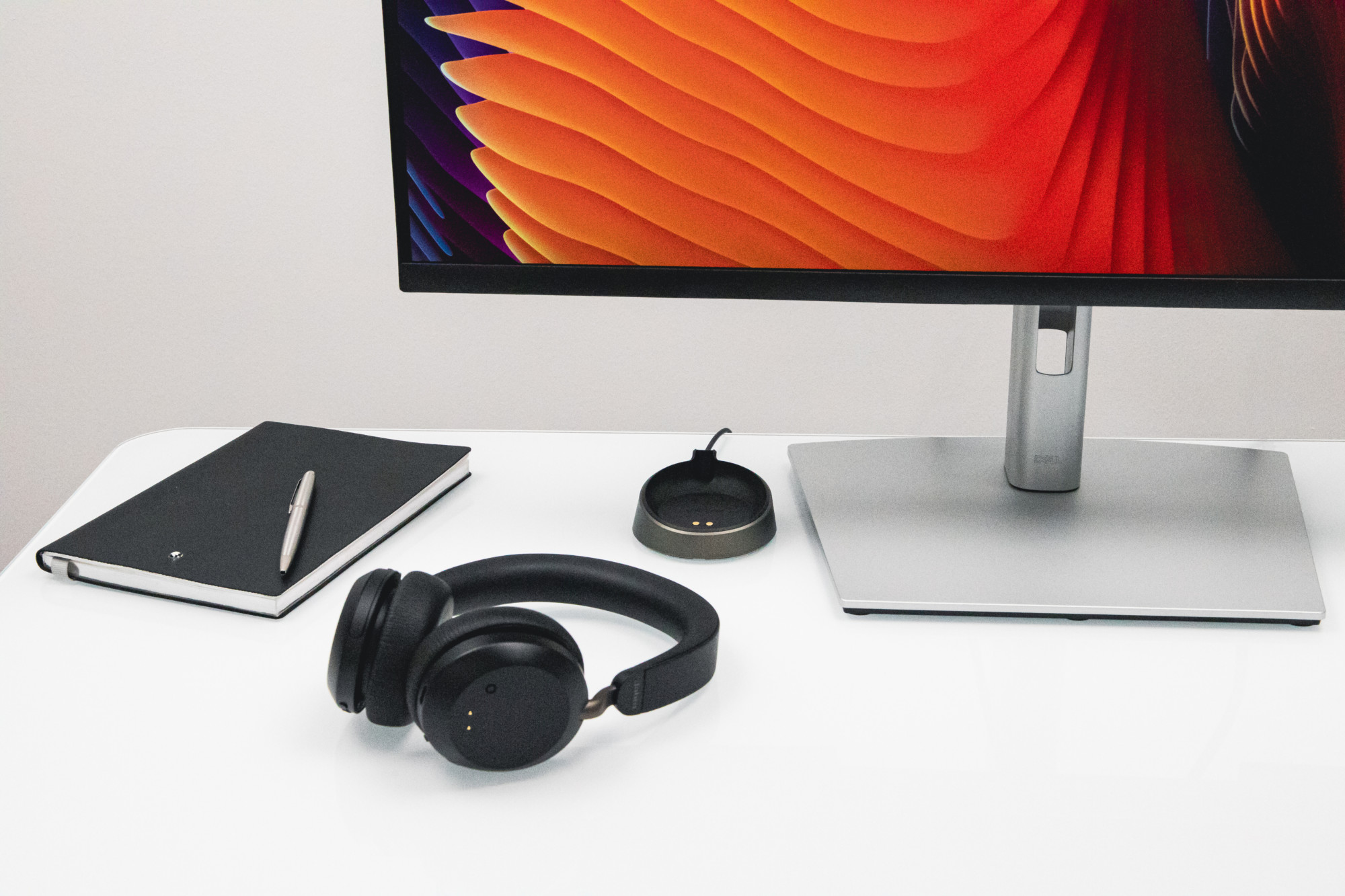 Complete your urban home office setup with wireless headphones.