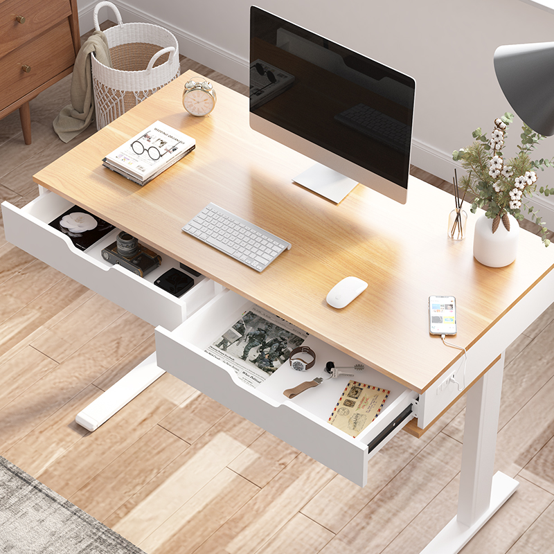 The Ola Height Adjustable Desk from Koble Designs, a stylish and modern design that combines maple wood and classic white to create an elegant piece of furniture for your home’s aesthetic.