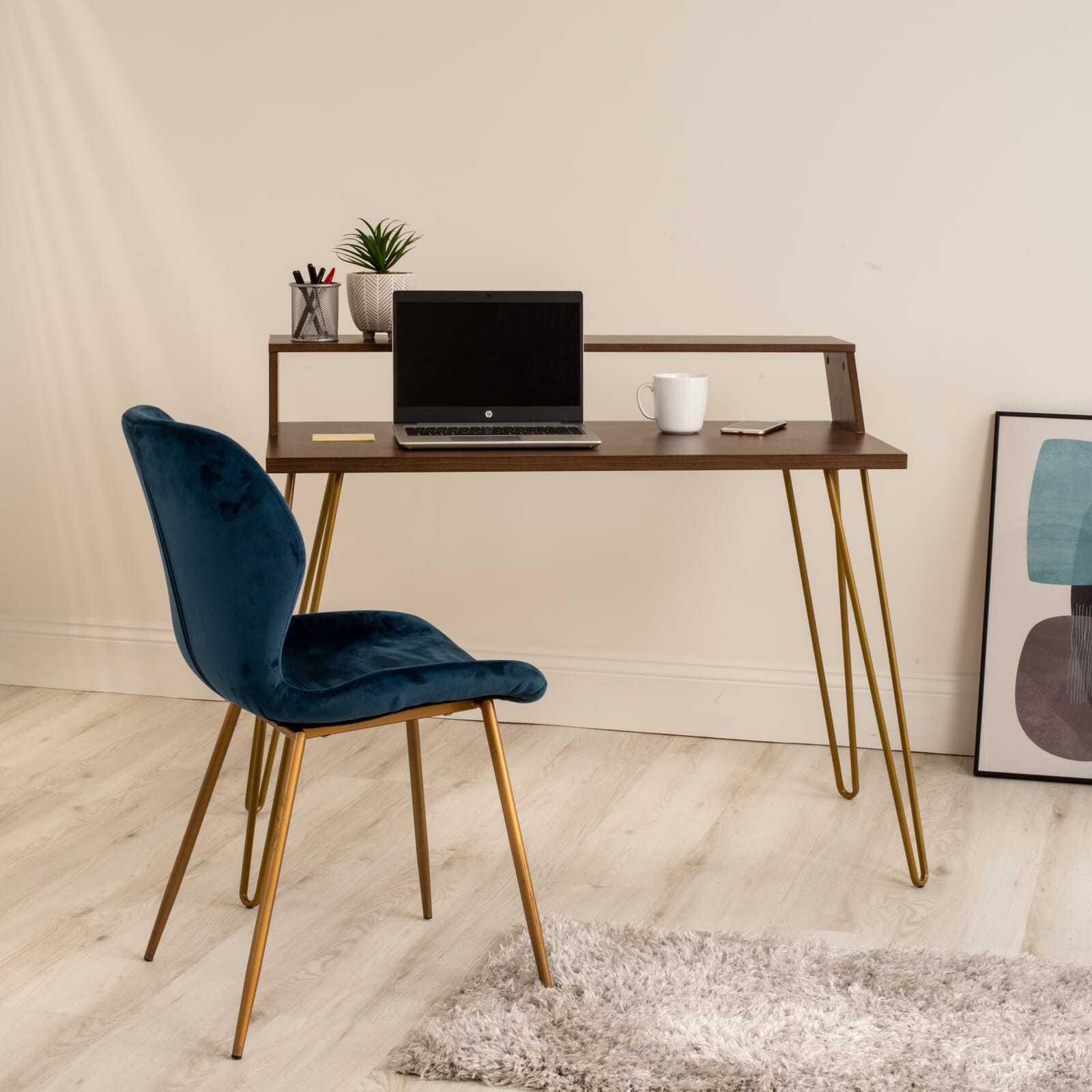 The Bea Smart Desk from Koble features an integrated wireless charging point to keep your phone topped up while you work. 