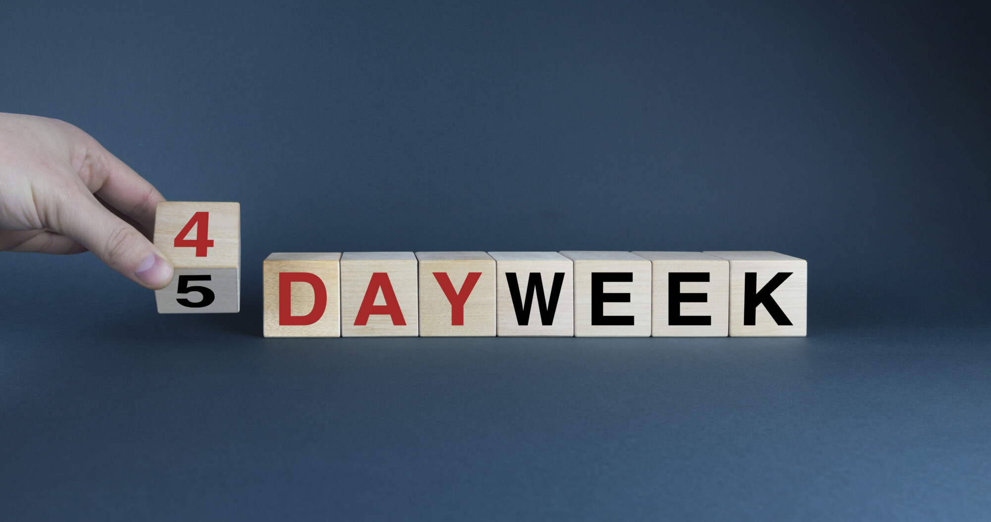 4 or 5 day week. The cubes form the choice words 4 or 5 day week. Employment and business concept, Five-day or Four-day workweek