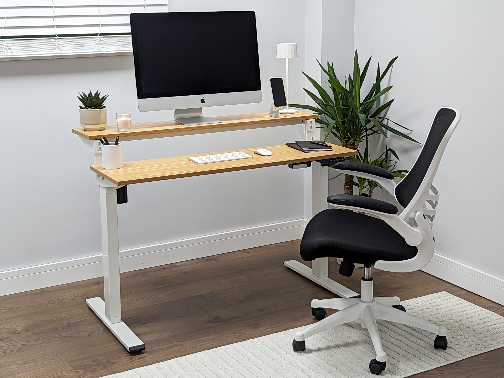 Smart height adjustable desk featuring two tiers. 